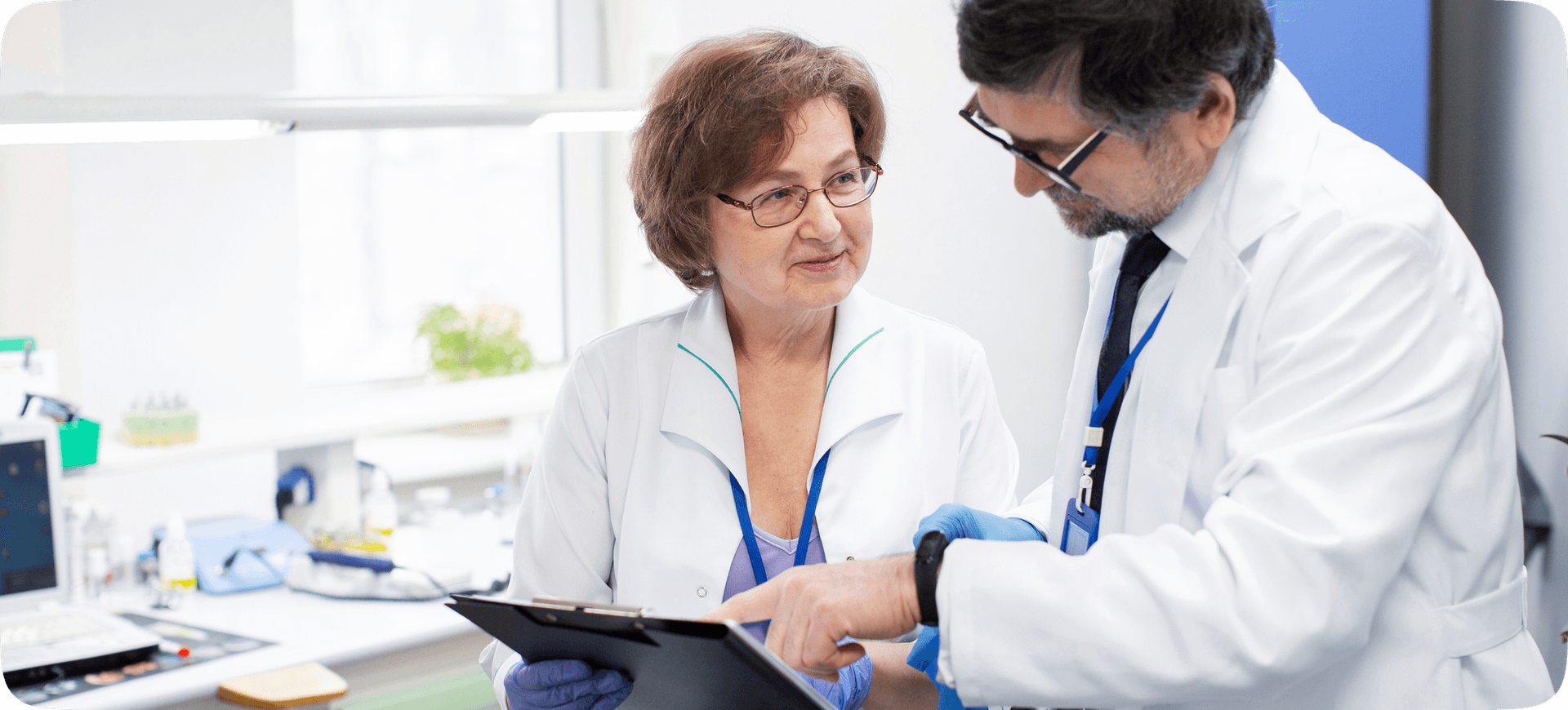 Doctors reviewing patient data